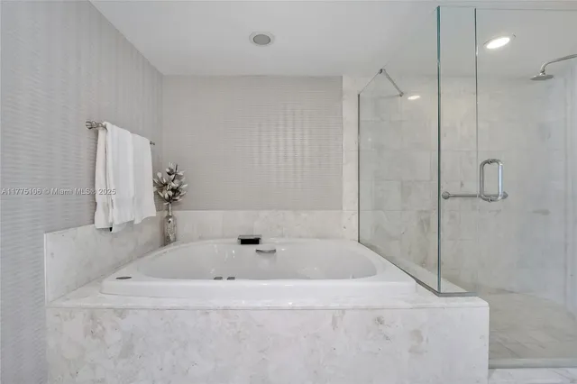 a view of a livingroom with furniture and a window