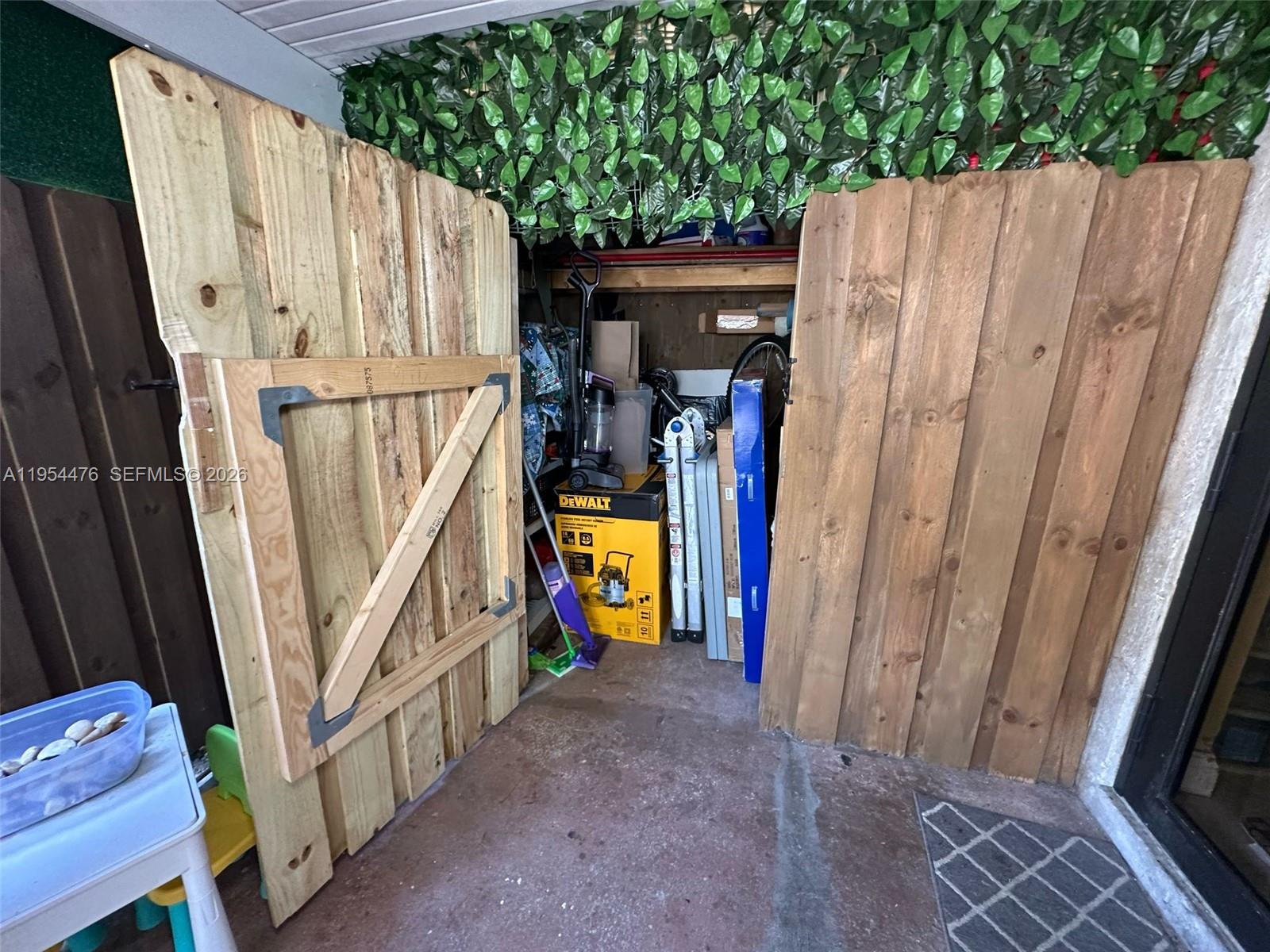 11537 Southwest 6th Street Sweetwater, FL 33174 - Photo 5 of 7 a view of a closet with stuff