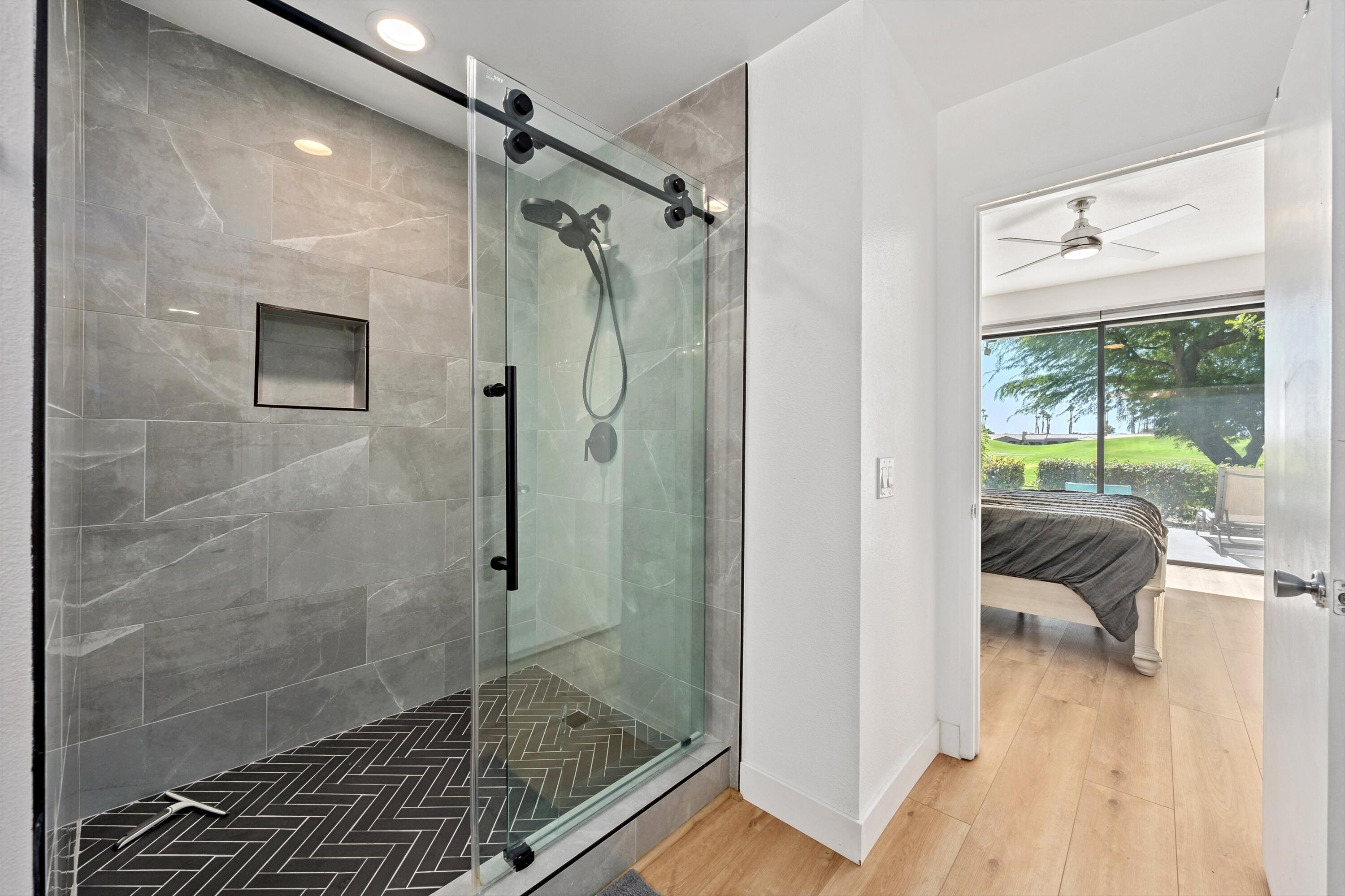 54326 Oak-Tree, Unit A122 La Quinta, CA 92253 - Photo 13 of 32 a bathroom with a shower