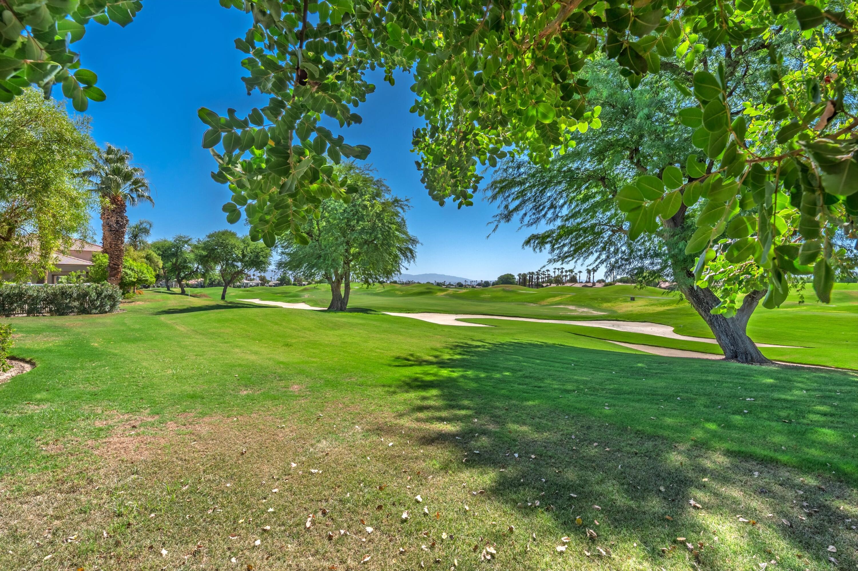 54326 Oak-Tree, Unit A122 La Quinta, CA 92253 - Photo 21 of 32 a view of a golf course