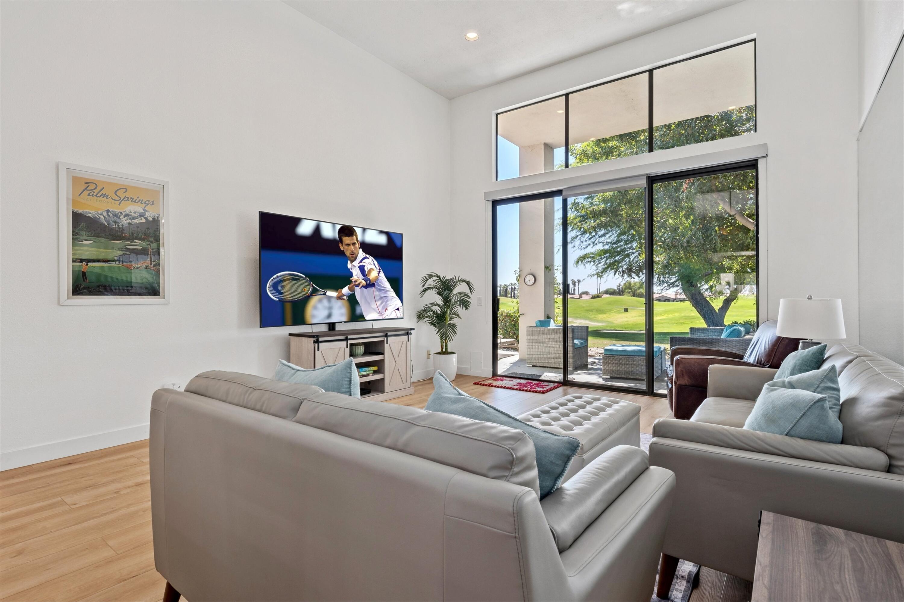54326 Oak-Tree, Unit A122 La Quinta, CA 92253 - Photo 3 of 32 a living room with furniture and a large window
