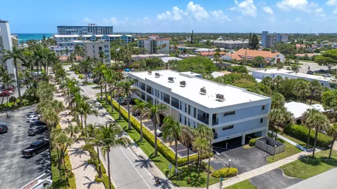 a view of a balcony with chairs