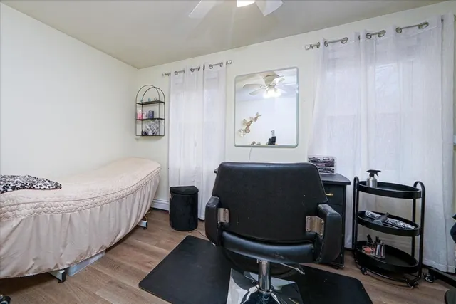 a bedroom with a bed and furniture