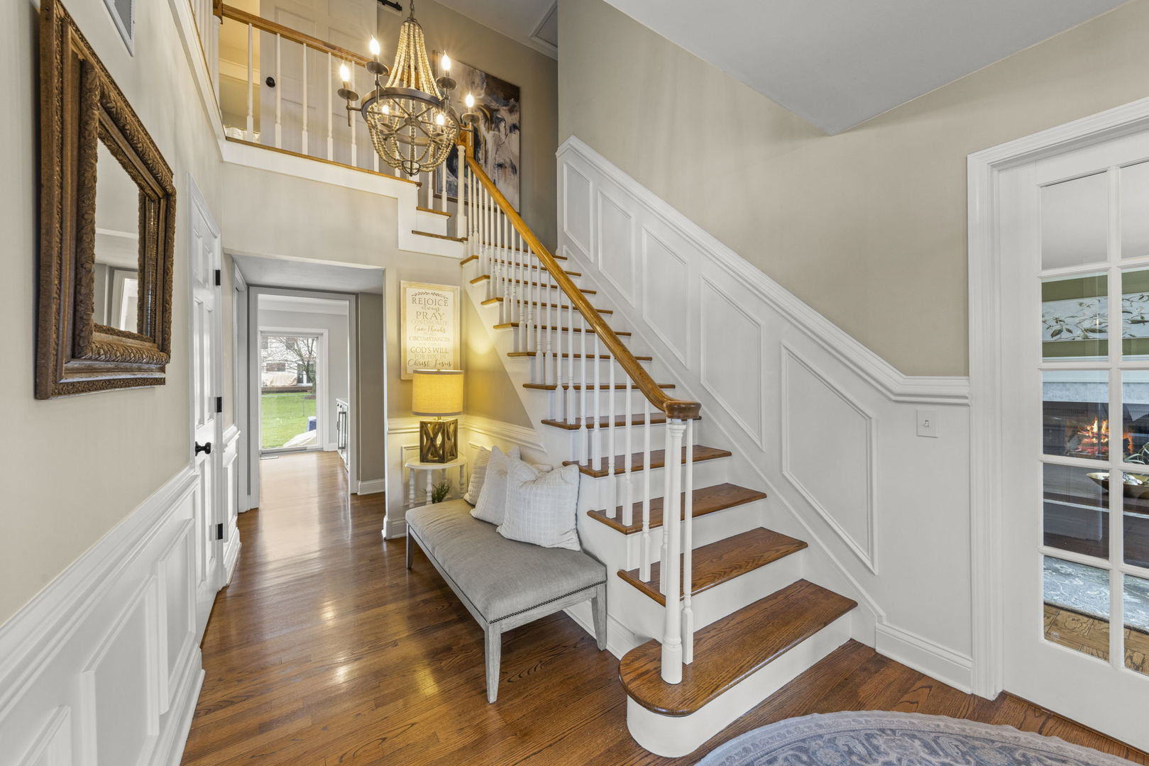 1908 Gladstone Drive Wheaton, IL 60189 - Photo 2 of 53 a view of entryway with wooden floor and stairs