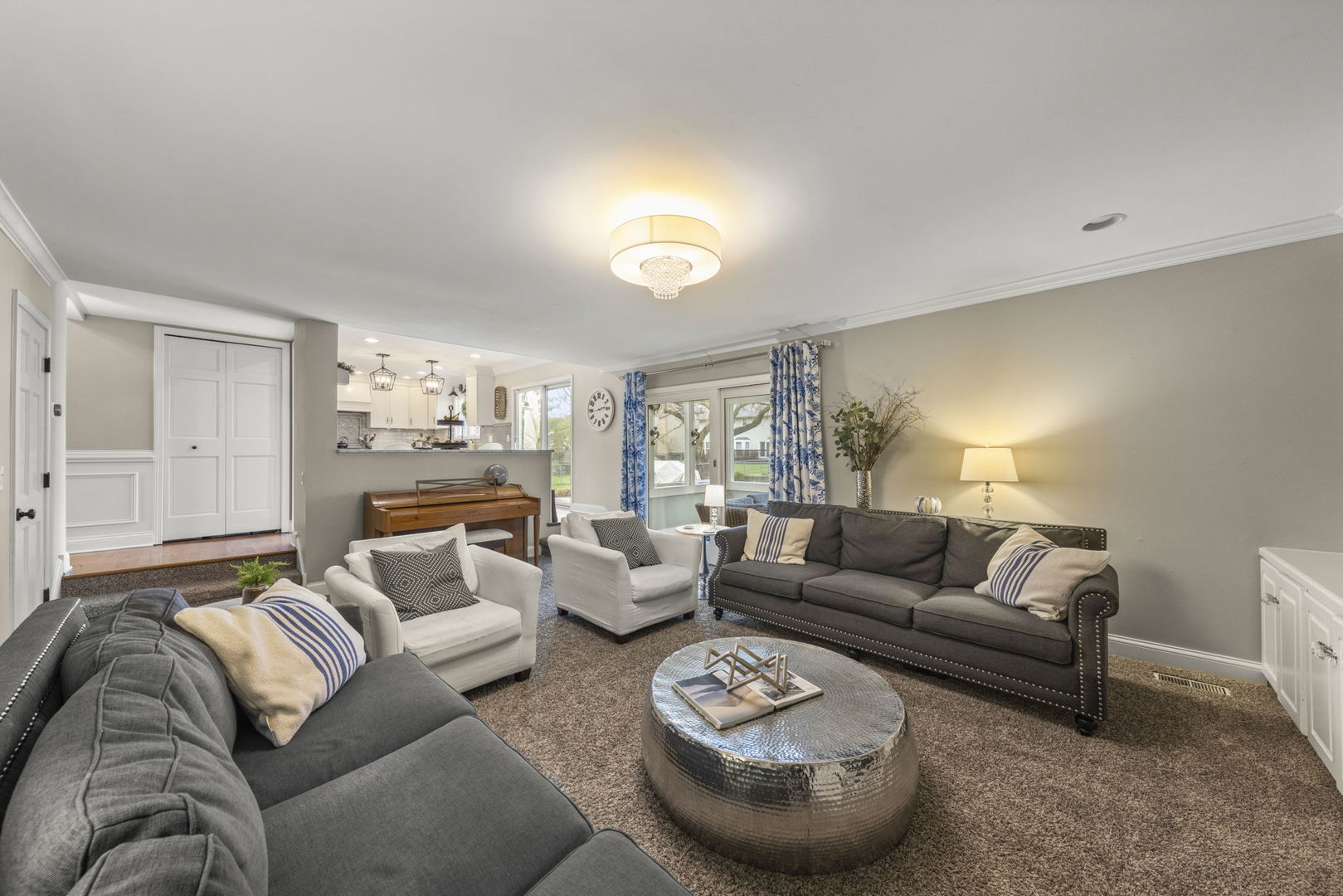 1908 Gladstone Drive Wheaton, IL 60189 - Photo 9 of 53 a living room with furniture and a large window