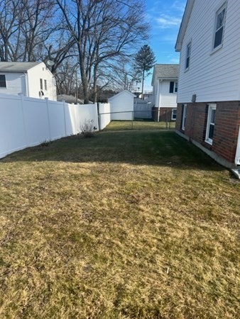 30-32 Joseph Street Springfield, MA 01119 - Photo 20 of 20 a view of a backyard with a large tree