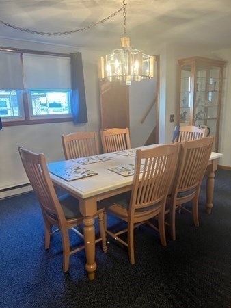 30-32 Joseph Street Springfield, MA 01119 - Photo 2 of 20 a view of a dining room with furniture window and wooden floor