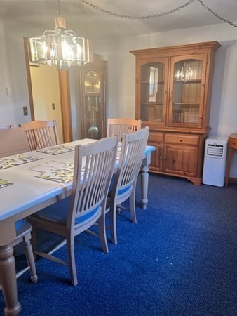 30-32 Joseph Street Springfield, MA 01119 - Photo 3 of 20 a view of a dining room with furniture window and wooden floor