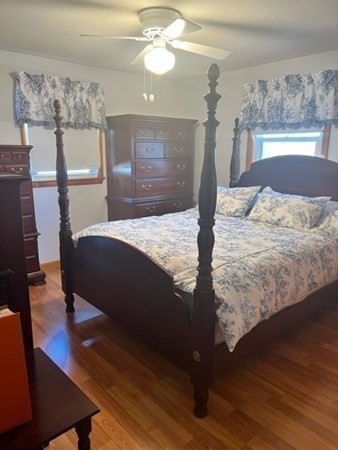 30-32 Joseph Street Springfield, MA 01119 - Photo 10 of 20 a bed sitting in a bedroom next to a lamp