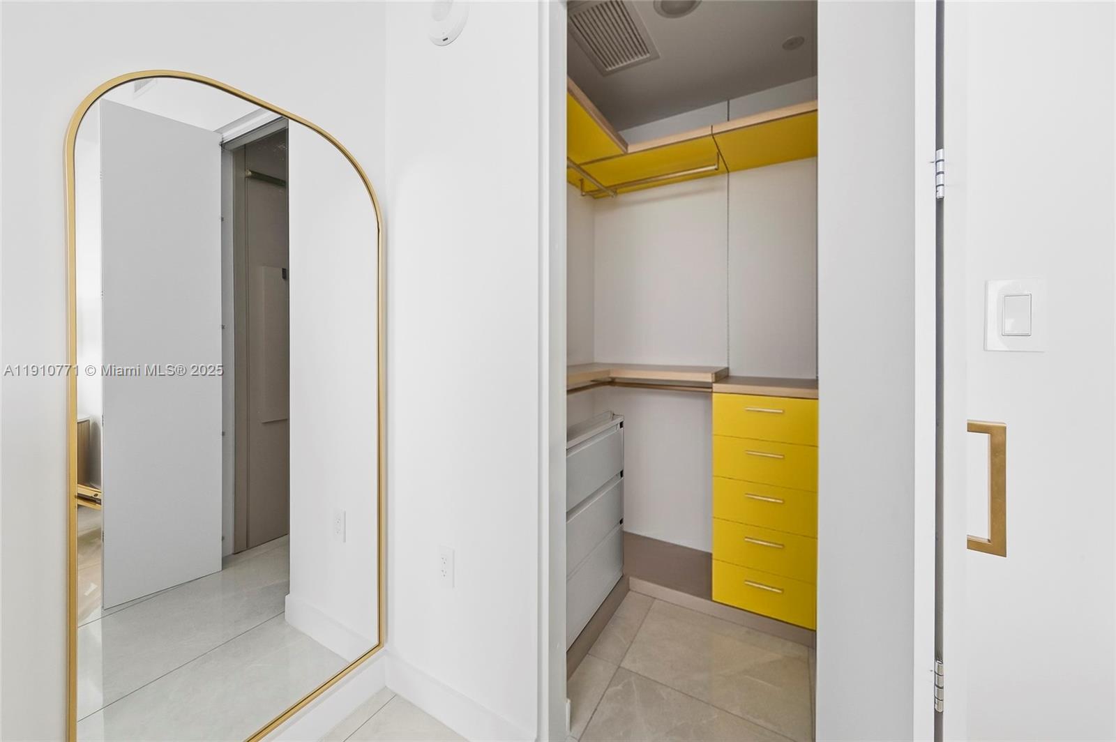 2678 Tigertail Avenue, Unit 1110 Miami, FL 33133 - Photo 21 of 77 a view of a bathroom with a tub and a shower