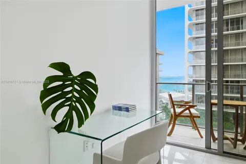 a view of a swimming pool with a terrace