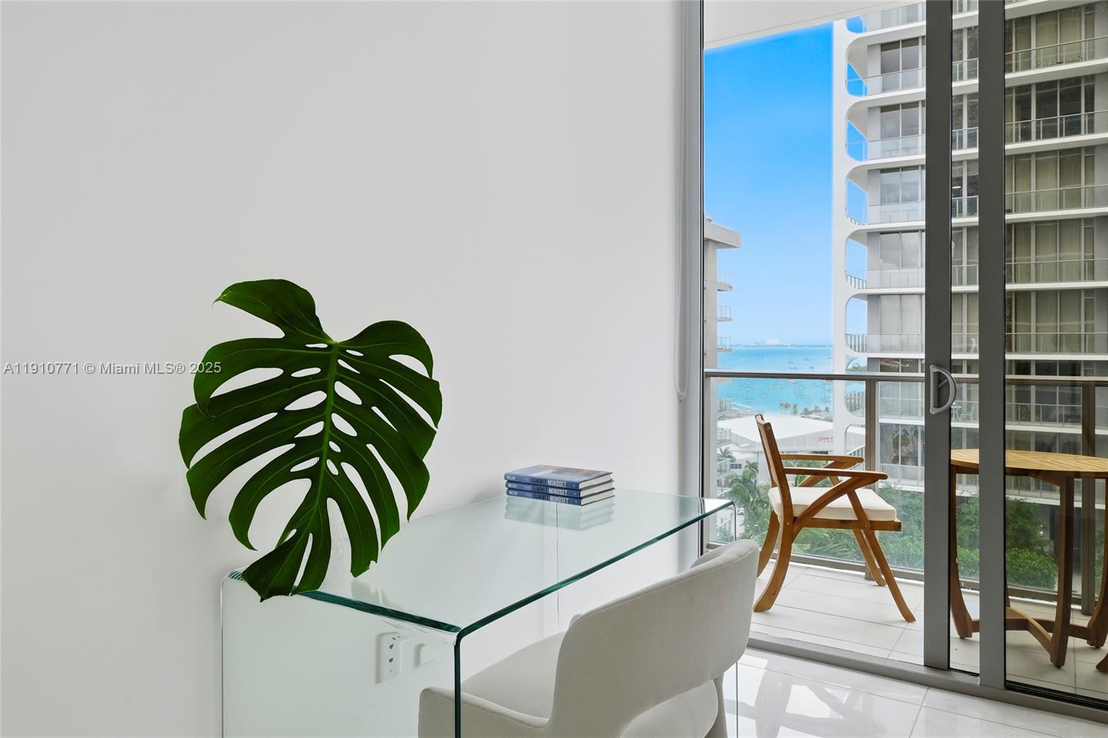 2678 Tigertail Avenue, Unit 1110 Miami, FL 33133 - Photo 29 of 77 a view of a workspace with furniture