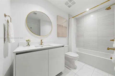 a view of swimming pool with a lounge chairs