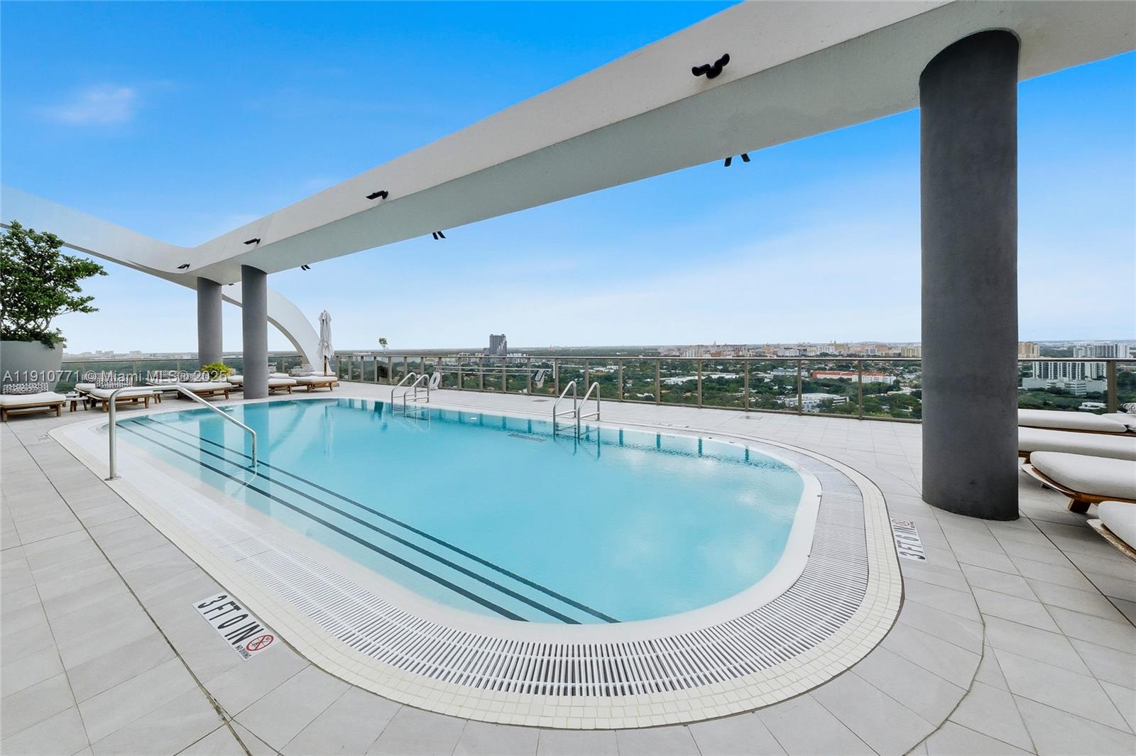 2678 Tigertail Avenue, Unit 1110 Miami, FL 33133 - Photo 45 of 77 a view of a swimming pool with a terrace