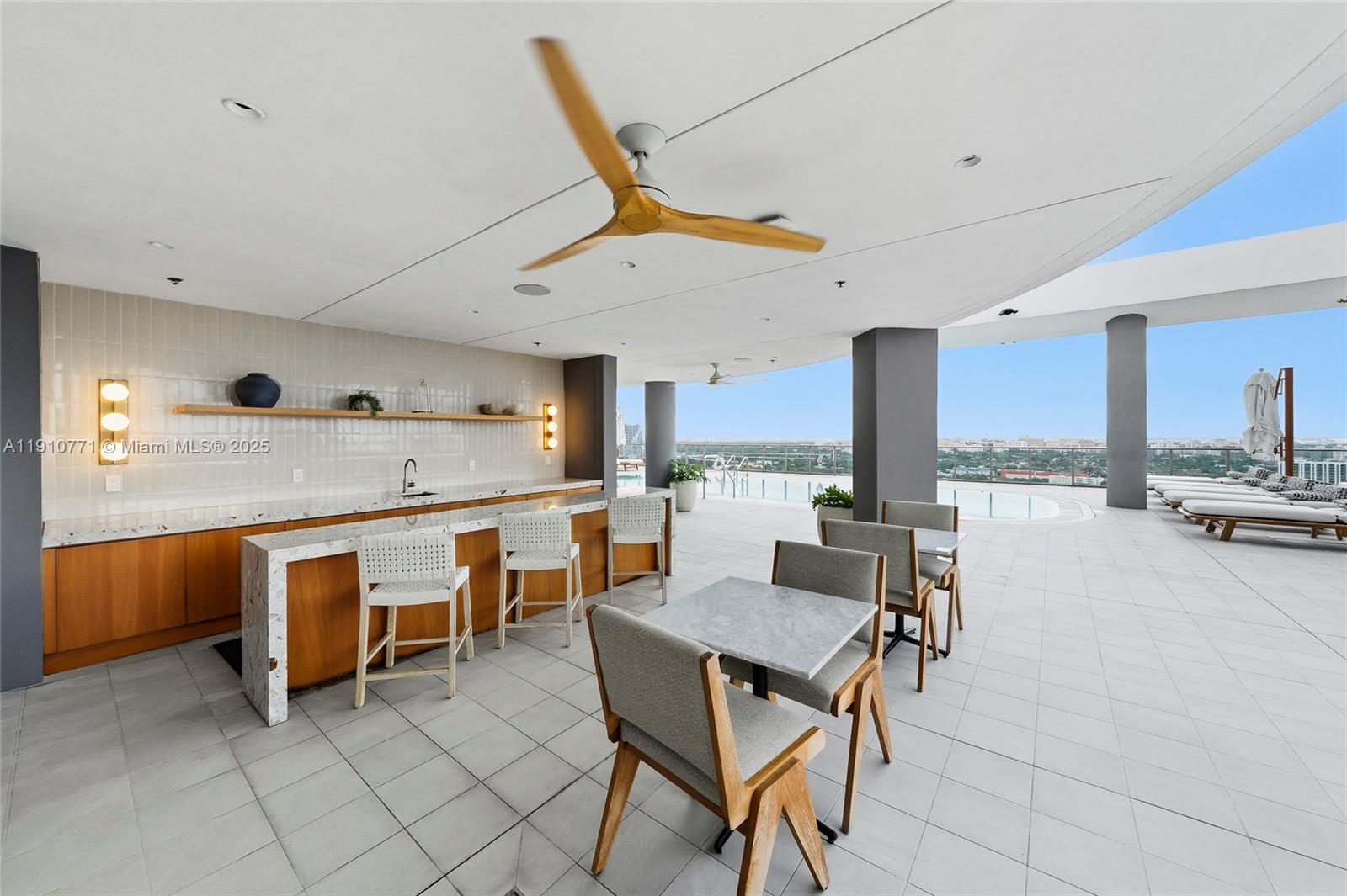 2678 Tigertail Avenue, Unit 1110 Miami, FL 33133 - Photo 47 of 77 lounge pool deck