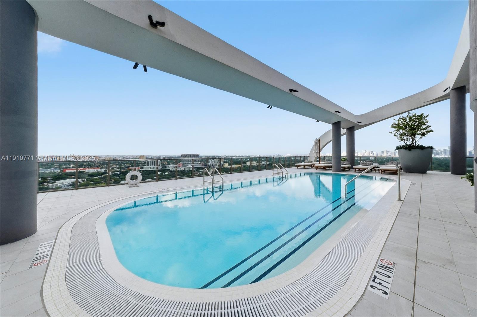 2678 Tigertail Avenue, Unit 1110 Miami, FL 33133 - Photo 49 of 77 a view of a swimming pool with a lake view