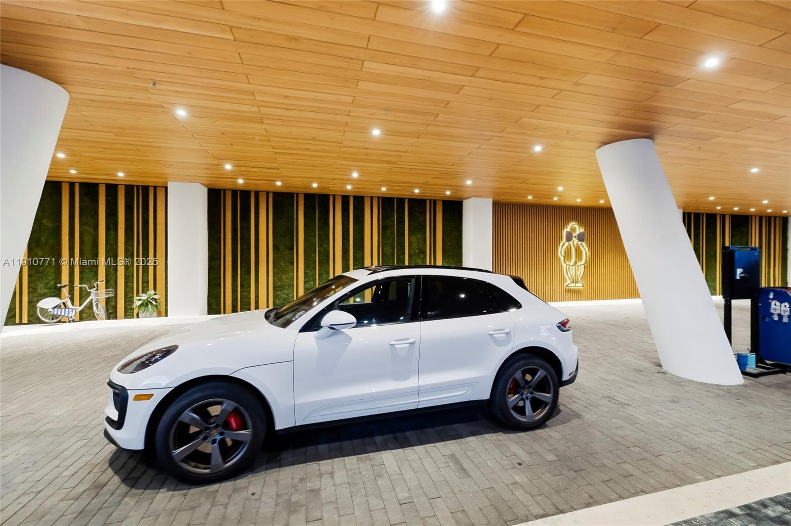 2678 Tigertail Avenue, Unit 1110 Miami, FL 33133 - Photo 70 of 77 a view of a car parked in front of a building