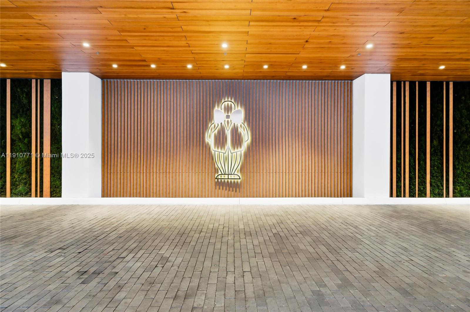 2678 Tigertail Avenue, Unit 1110 Miami, FL 33133 - Photo 72 of 77 a front view of a house with a big yard