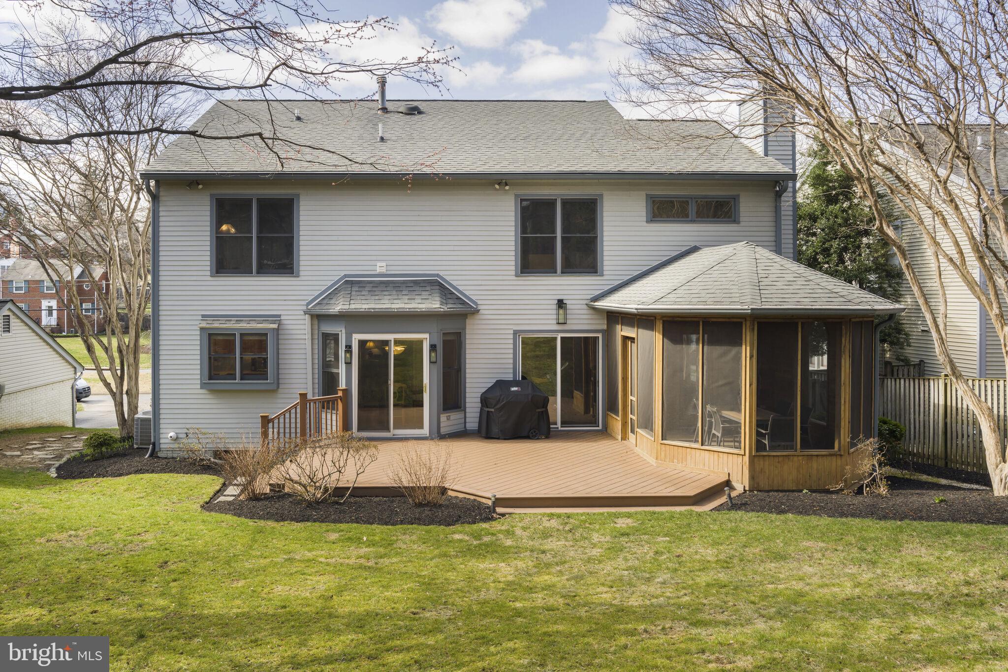 9501 Columbia Boulevard Silver Spring, MD 20910 - Photo 18 of 32 a view of a house with a yard patio and fire pit