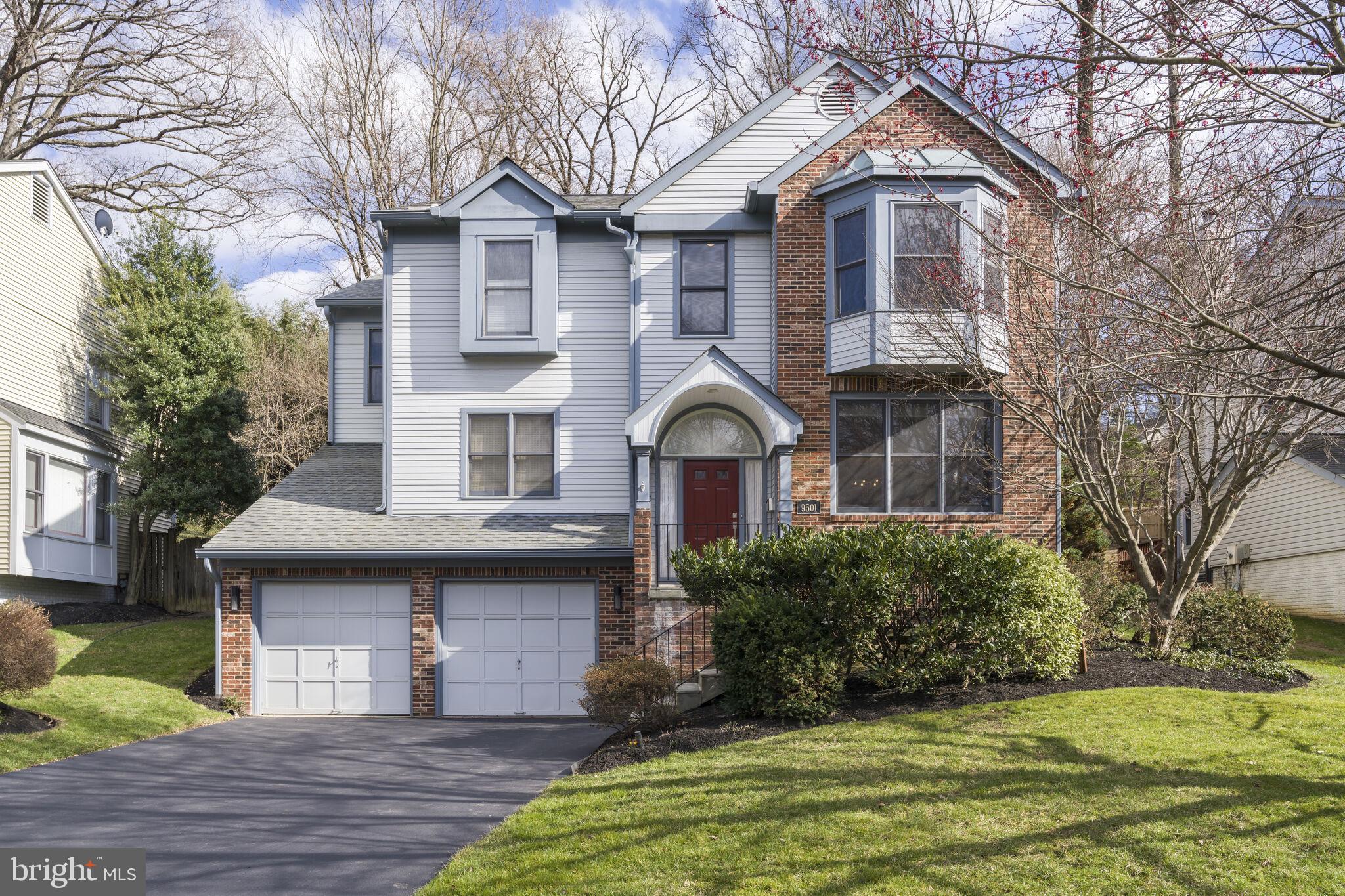 9501 Columbia Boulevard Silver Spring, MD 20910 - Photo 2 of 32 a front view of a house with a yard