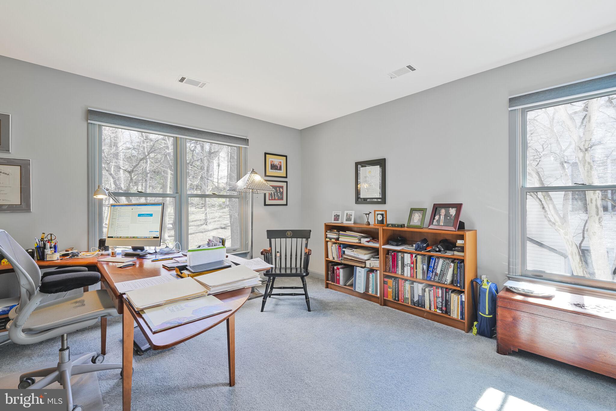 9501 Columbia Boulevard Silver Spring, MD 20910 - Photo 24 of 32 a room with furniture and a window