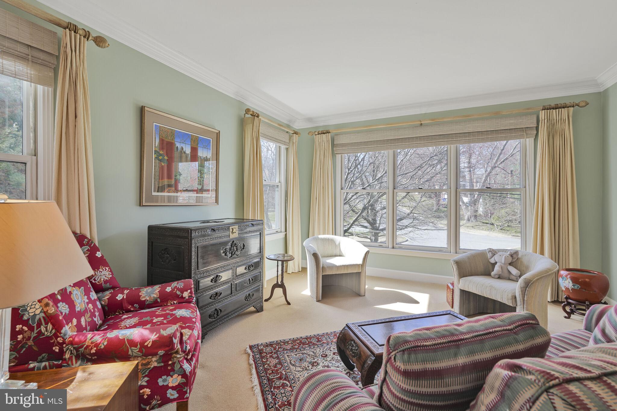9501 Columbia Boulevard Silver Spring, MD 20910 - Photo 5 of 32 a living room with furniture and a large window