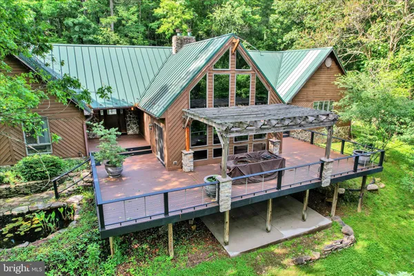 a backyard of a house with lots of green space