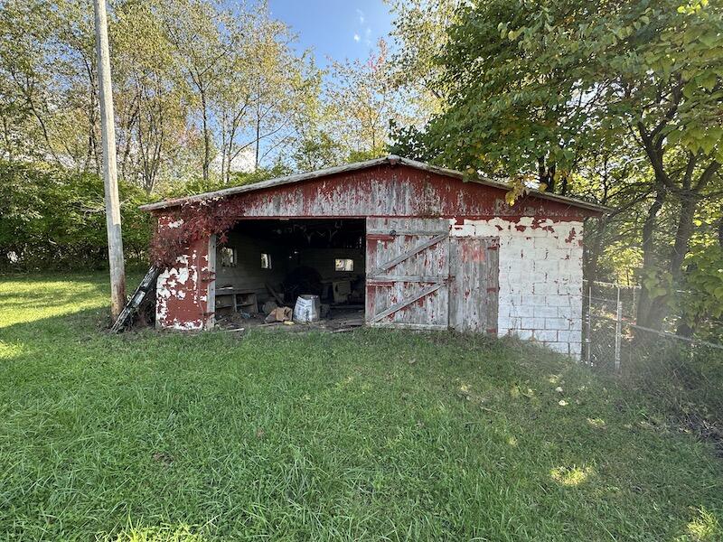 4537 Maple Branch Road Radford, VA 24141 - Photo 14 of 18 a view of a tiny house with a yard