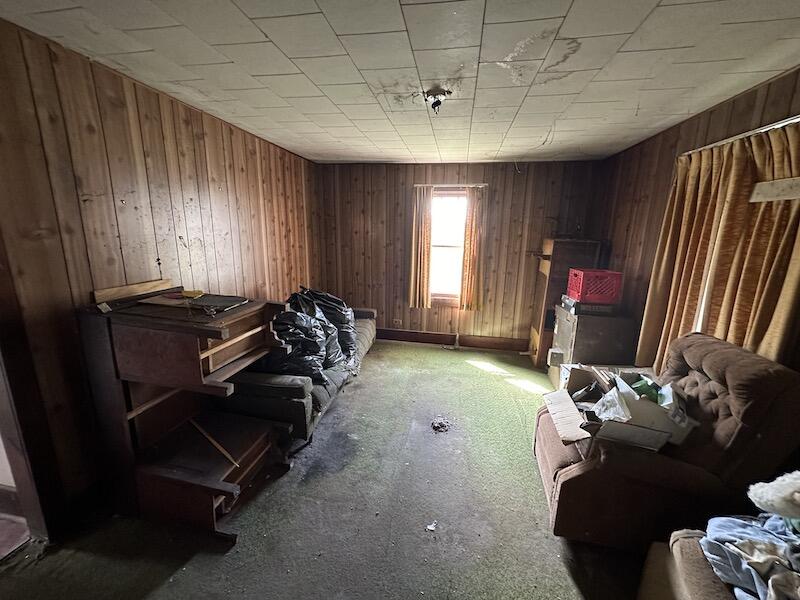 4537 Maple Branch Road Radford, VA 24141 - Photo 6 of 18 a room with furniture gym equipment and windows