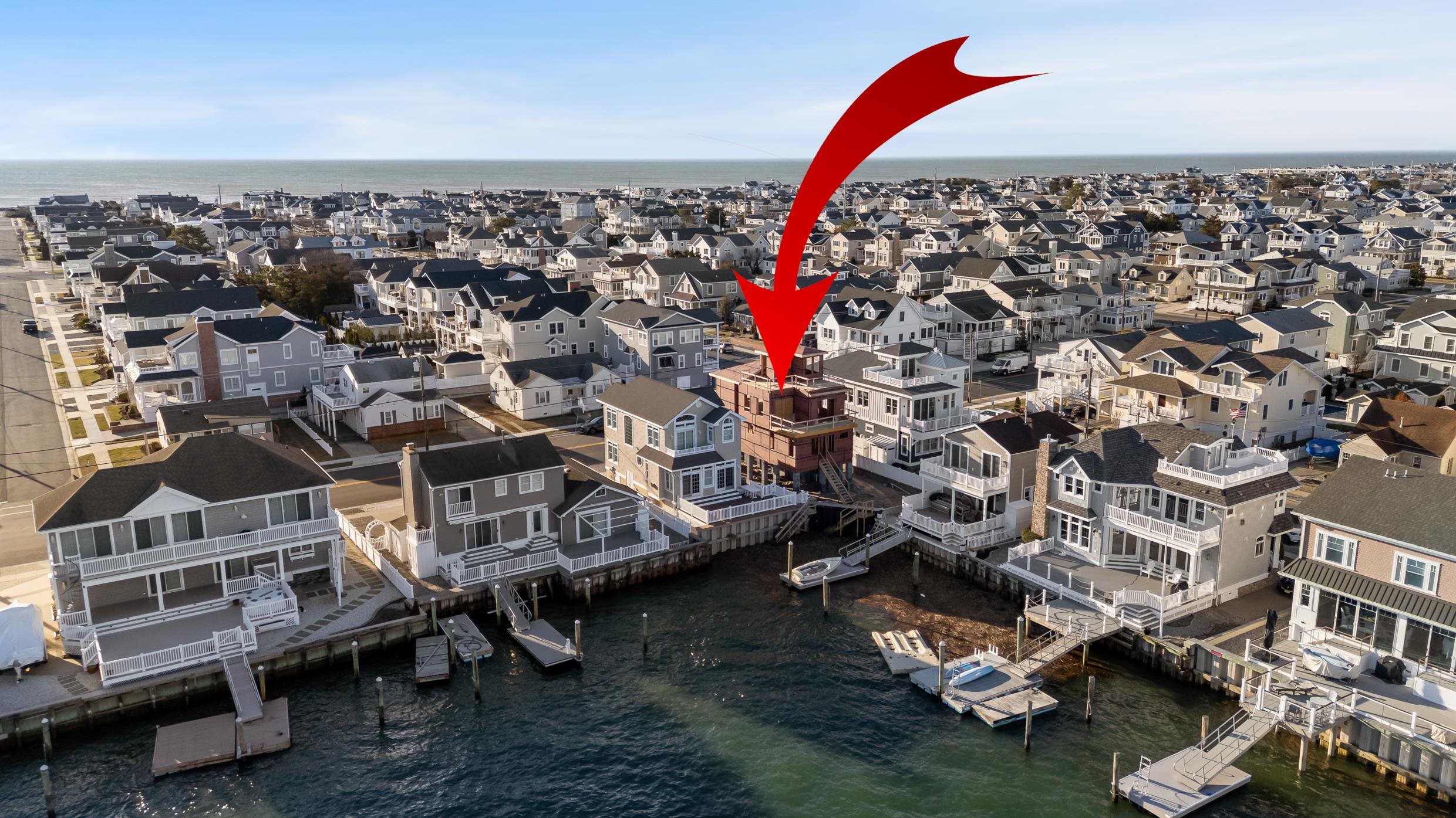 8527 3rd Stone Harbor, NJ 08247 - Photo 6 of 15 an aerial view of a house with a swimming pool patio and outdoor seating