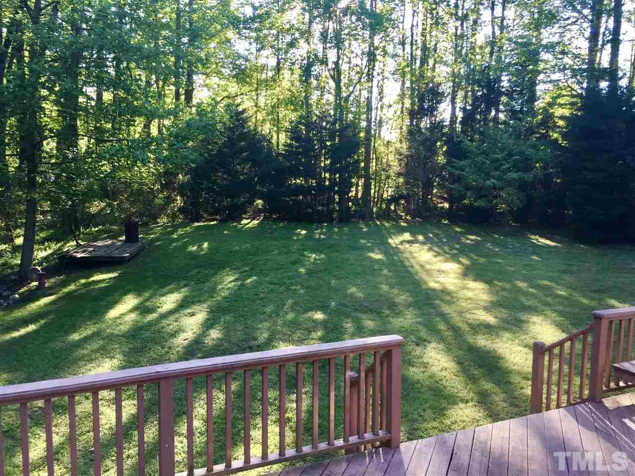 1244 Torchlight Way Raleigh, NC 27603 - Photo 3 of 20 a view of backyard from deck