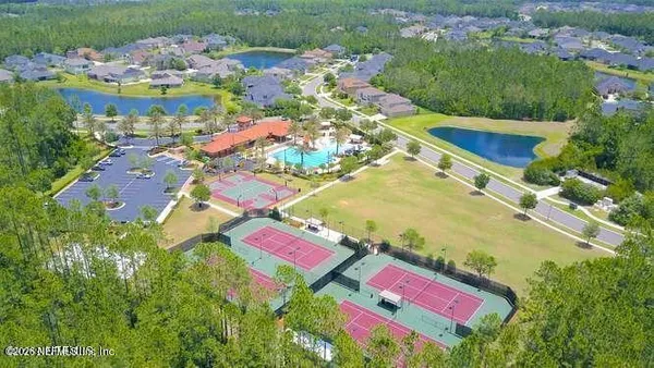 a view of a house with a yard porch and sitting area
