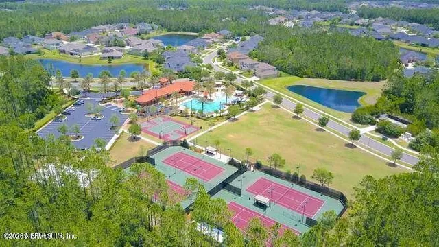 a view of a house with a yard porch and sitting area