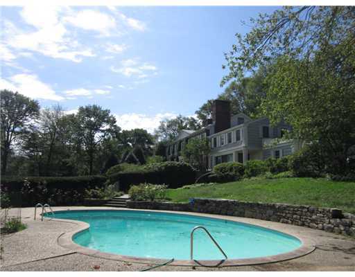 807 Smith Ridge Road New Canaan, CT 06840 - Photo 5 of 10 a view of a swimming pool and a yard
