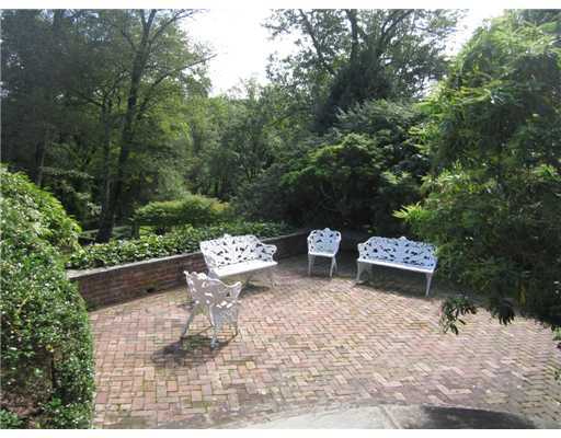 807 Smith Ridge Road New Canaan, CT 06840 - Photo 8 of 10 a view of a bench in a backyard