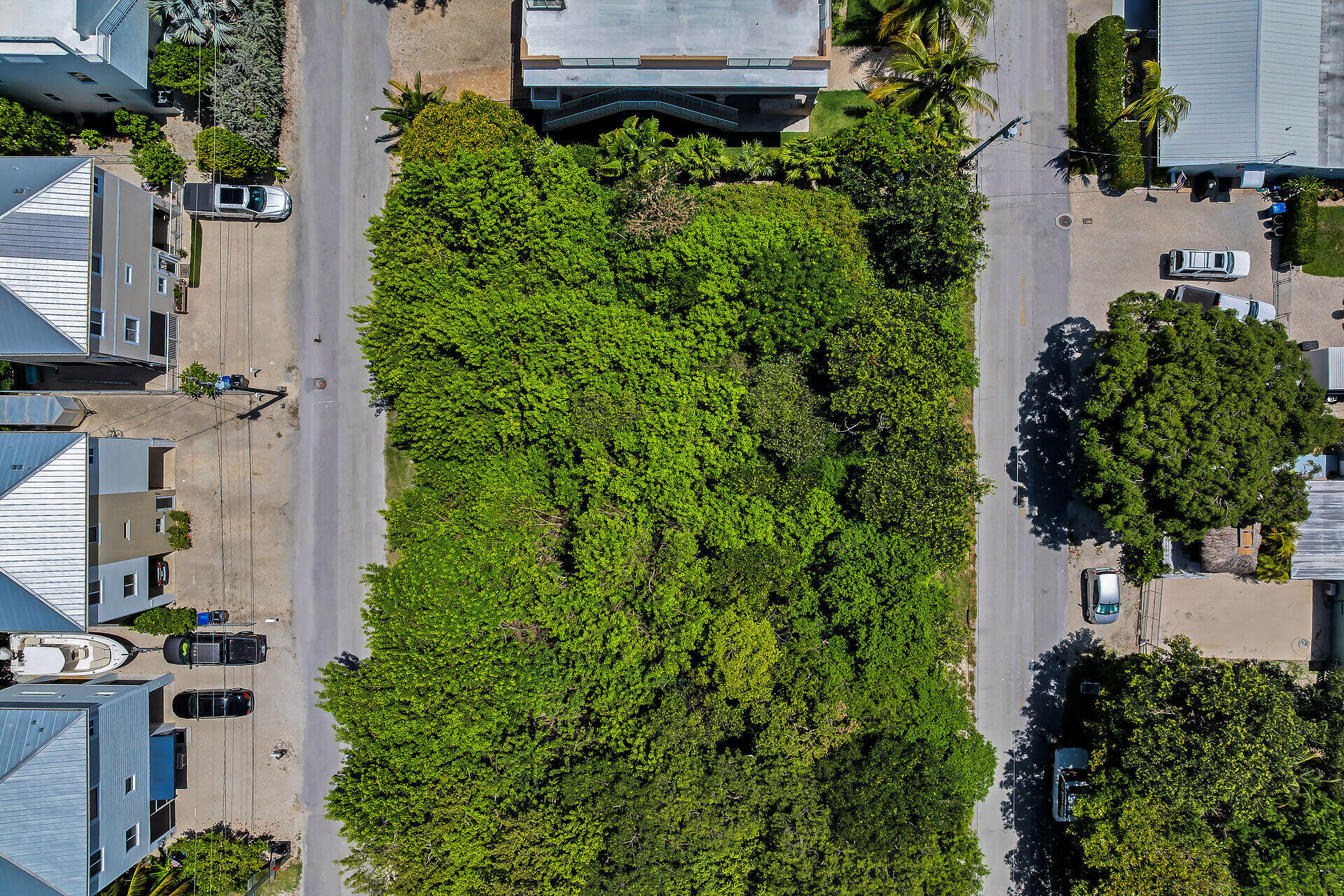 Lake View Dr Key Key Largo, FL 33037 - Photo 19 of 25 an aerial view of a house with a yard and garden