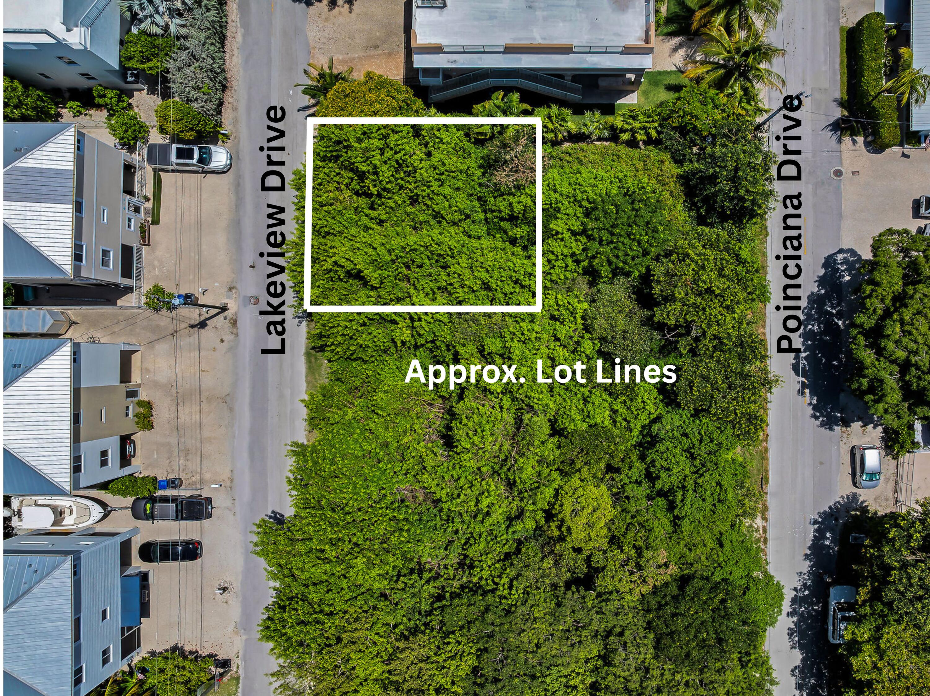 Lake View Dr Key Key Largo, FL 33037 - Photo 3 of 25 an aerial view of a house with a garden