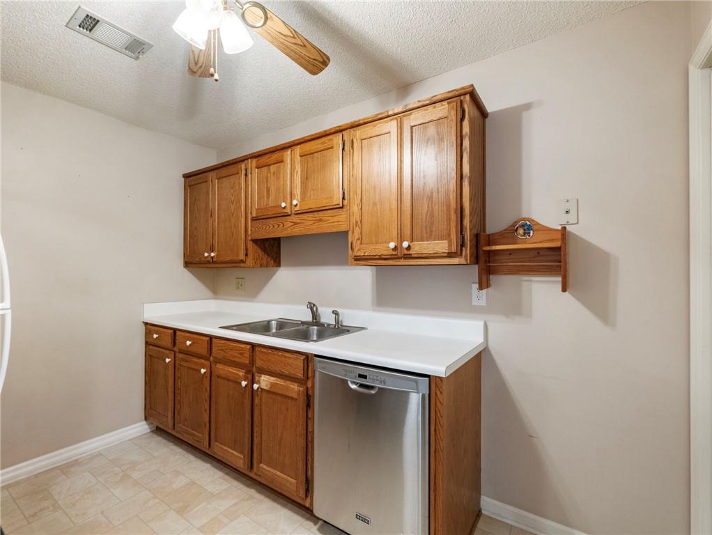 2235 Old Hamilton Place, Unit 100B Gainesville, GA 30507 - Photo 12 of 31 a kitchen with a sink cabinets and window