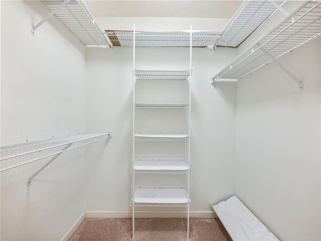 2235 Old Hamilton Place, Unit 100B Gainesville, GA 30507 - Photo 18 of 31 a view of an empty walk in closet
