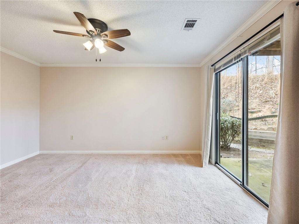 2235 Old Hamilton Place, Unit 100B Gainesville, GA 30507 - Photo 27 of 31 a view of an empty room with a window