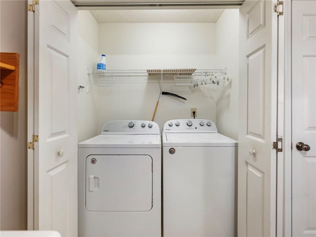 2235 Old Hamilton Place, Unit 100B Gainesville, GA 30507 - Photo 28 of 31 a utility room with dryer and washer