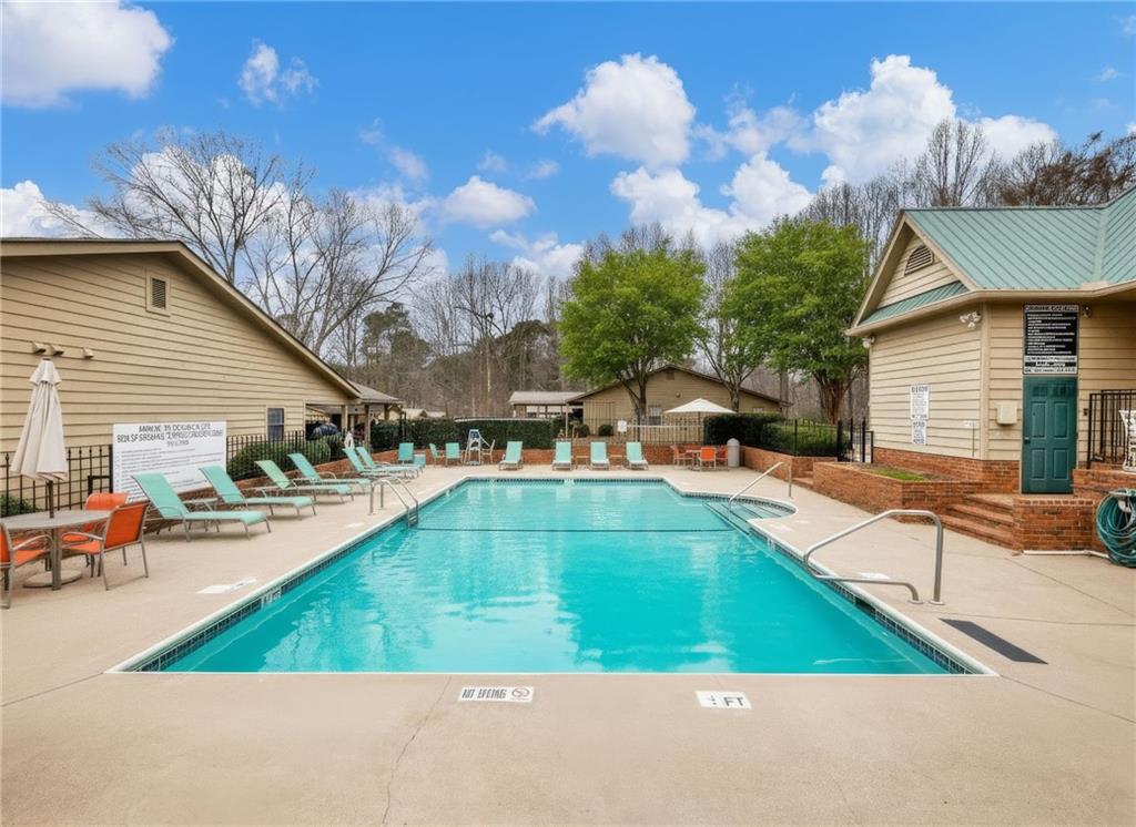 2235 Old Hamilton Place, Unit 100B Gainesville, GA 30507 - Photo 5 of 31 a view of a house with swimming pool