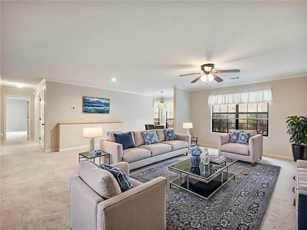 2235 Old Hamilton Place, Unit 100B Gainesville, GA 30507 - Photo 7 of 31 a living room with furniture and a large window
