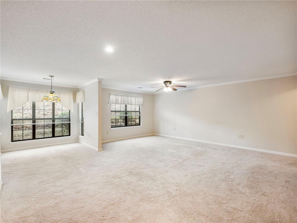 2235 Old Hamilton Place, Unit 100B Gainesville, GA 30507 - Photo 9 of 31 a view of an empty room with a window