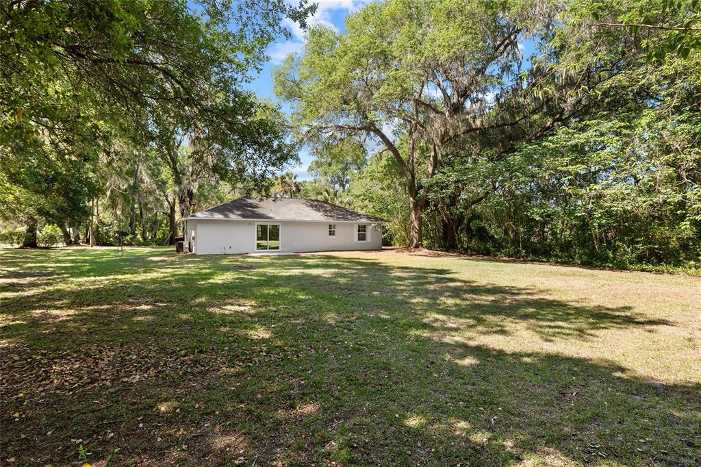 4329 Northwest 155th Street Reddick, FL 32686 - Photo 52 of 52 a view of a outdoor space with a house