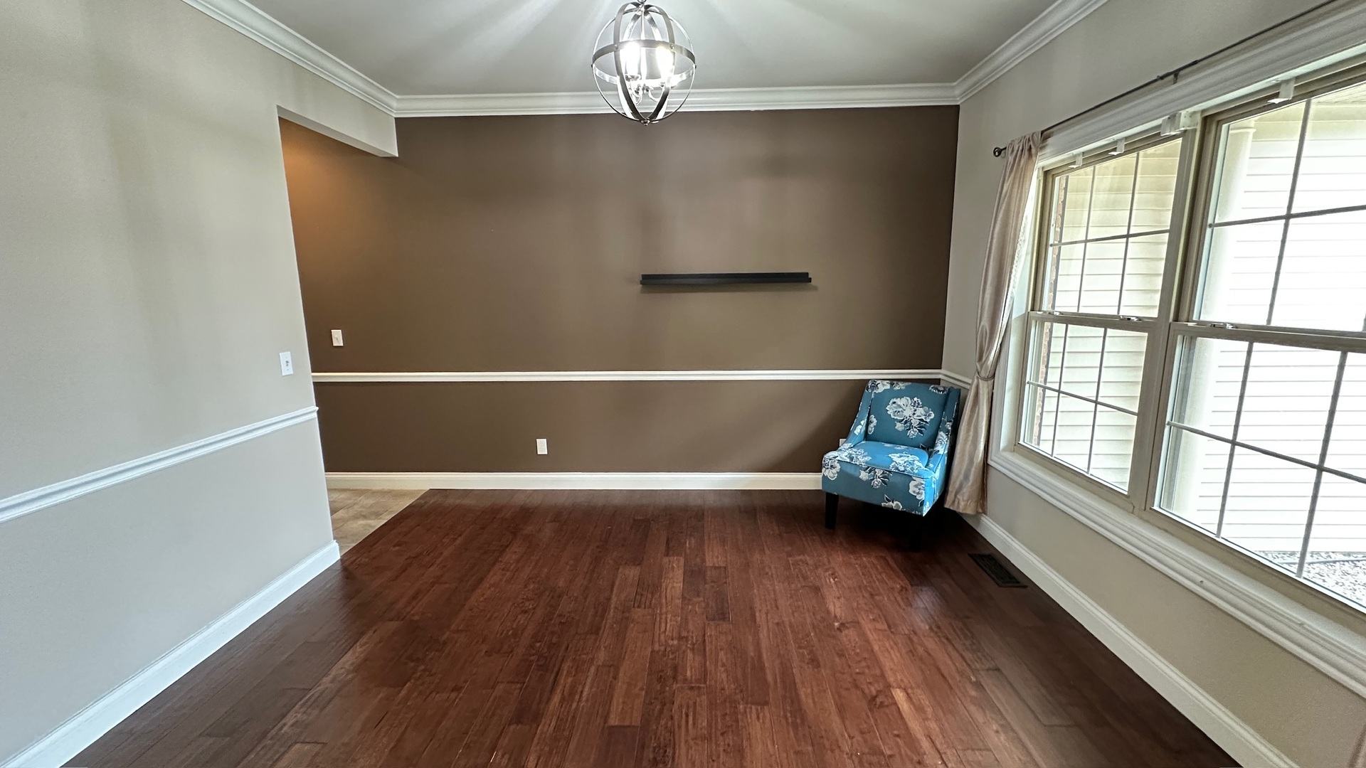 2906 Springhill Lane Champaign, IL 61822 - Photo 12 of 48 wooden floor in an empty room with a window