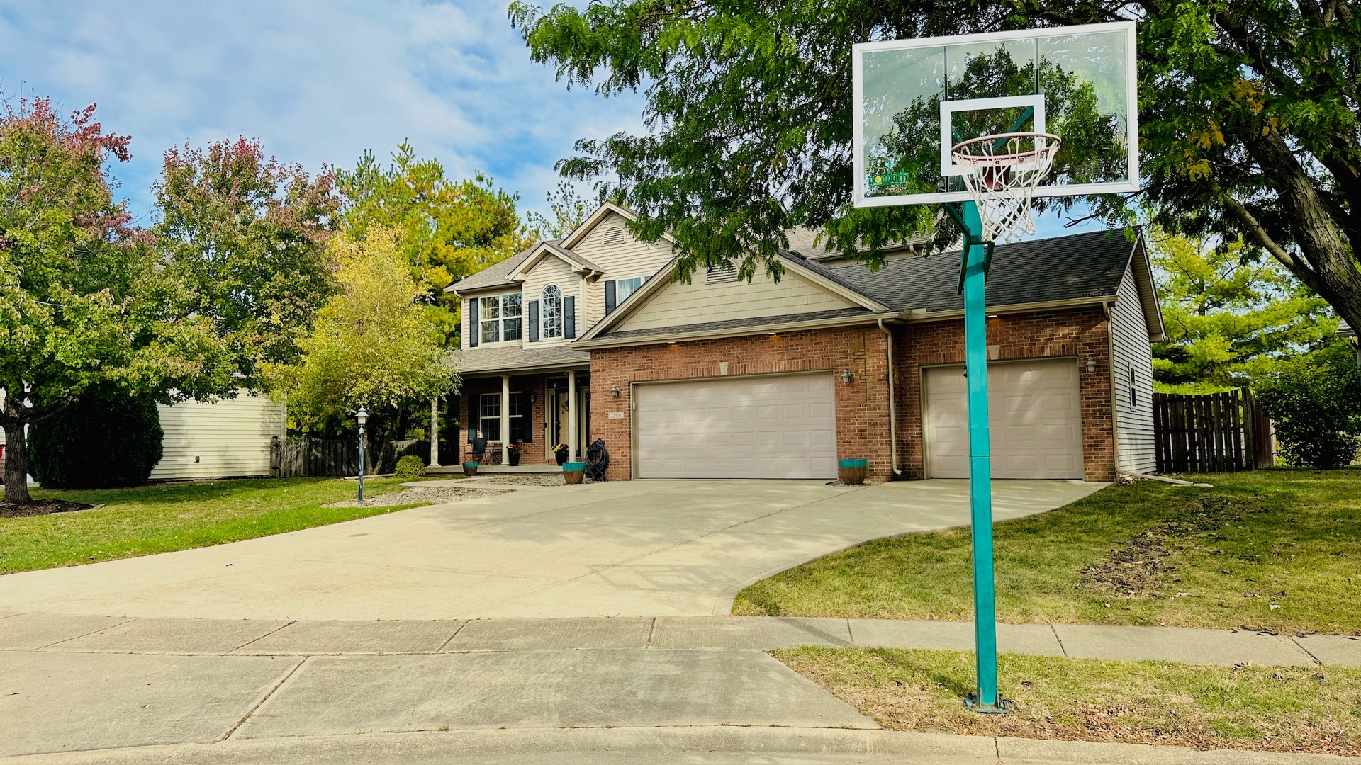 2906 Springhill Lane Champaign, IL 61822 - Photo 2 of 48 a front view of a house with garden