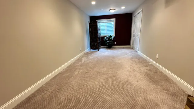 an empty room with a window