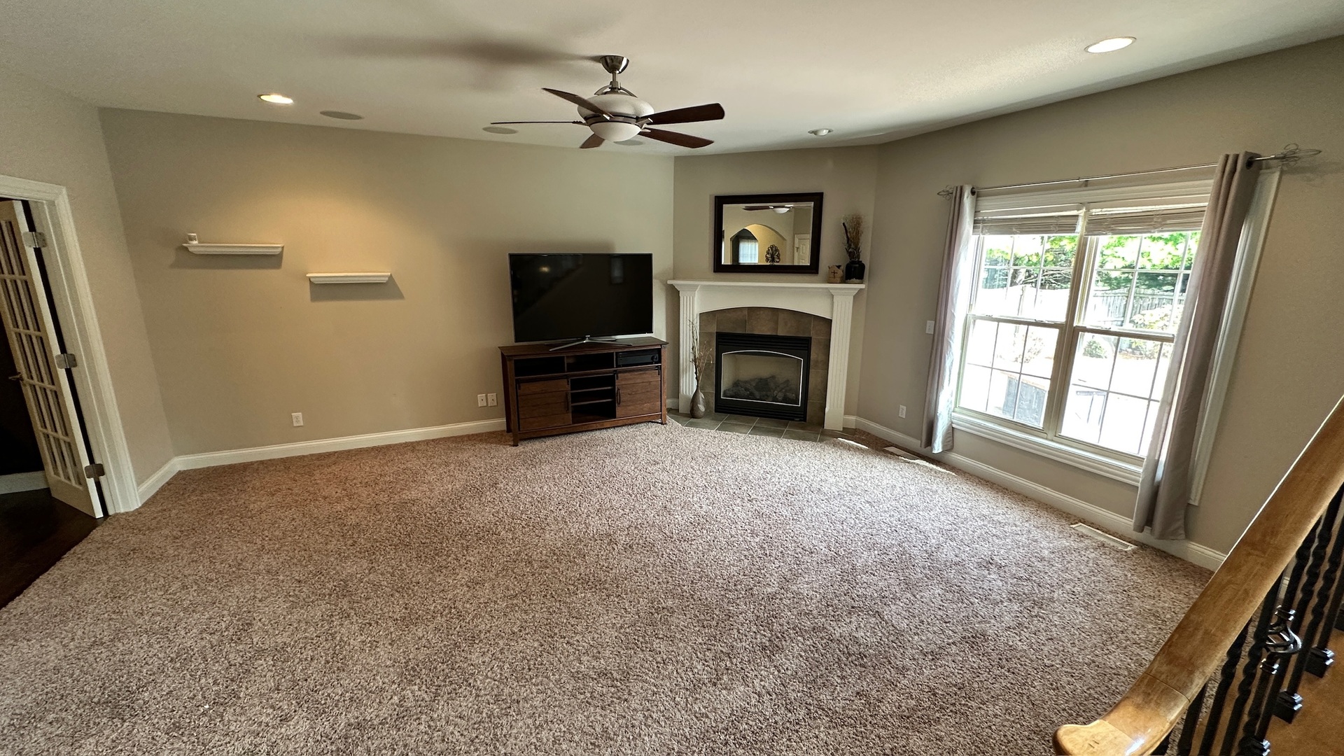 2906 Springhill Lane Champaign, IL 61822 - Photo 6 of 48 a view of livingroom with furniture flat screen tv and fire place