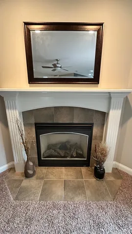 a living room with a fireplace